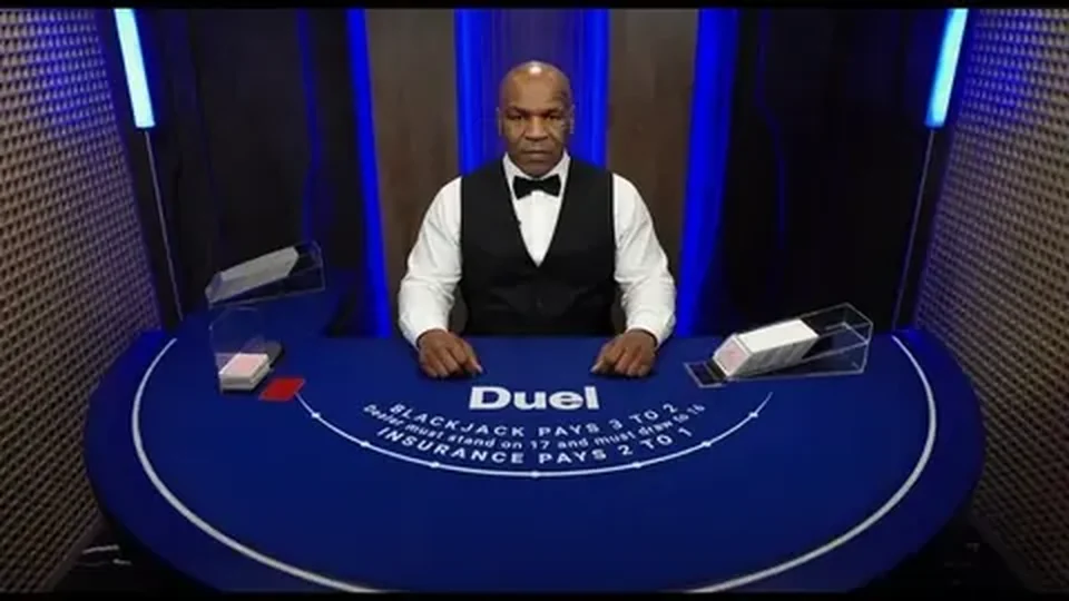 Mike Tyson dealing at the Duel blackjack table